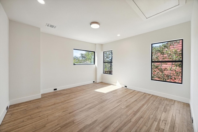 empty room with light wood-type flooring