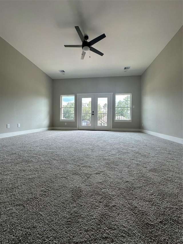 1037 Rd 6609, Dayton, TX 77535 - carpeted empty room with a ceiling fan, baseboards, and french doors
