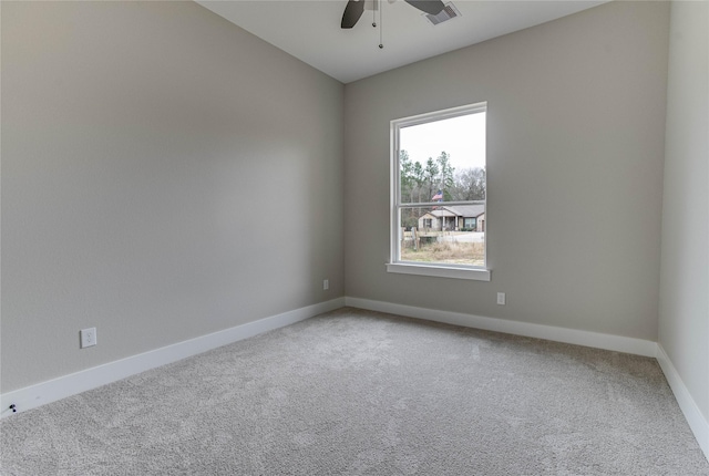 1037 Rd 6609, Dayton, TX 77535 - empty room with a ceiling fan, carpet flooring, and baseboards