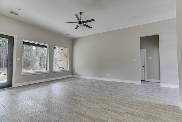 1037 Rd 6609, Dayton, TX 77535 - empty room featuring a ceiling fan, baseboards, and light wood finished floors