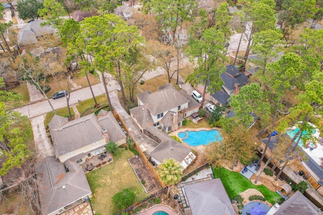 birds eye view of property with a residential view