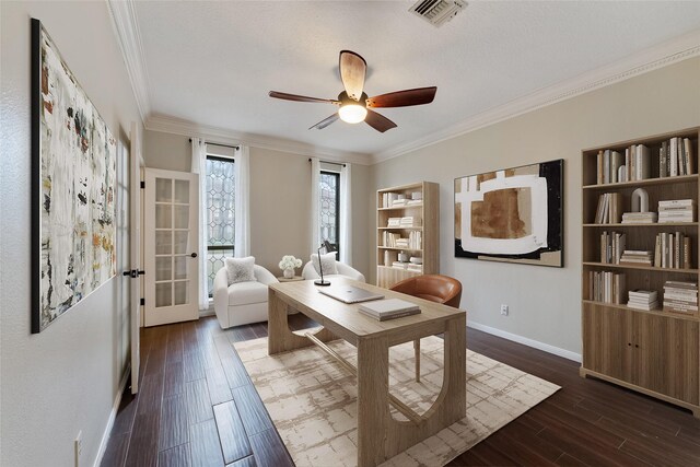 office area featuring crown molding, dark wood-type flooring, ceiling fan, and french doors