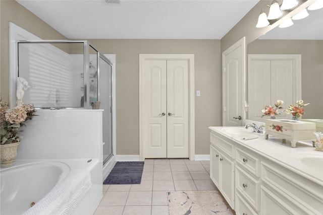 bathroom featuring vanity, separate shower and tub, and tile patterned floors