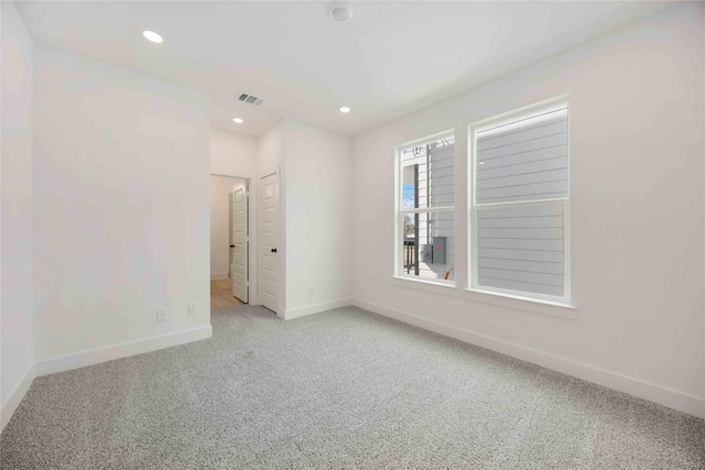 view of carpeted spare room