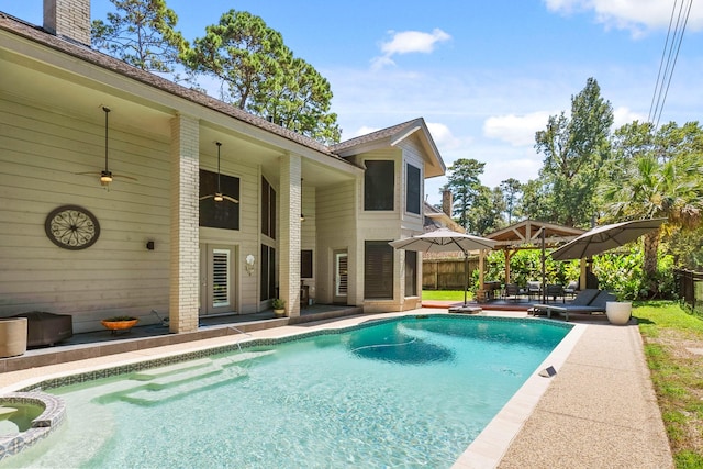 view of swimming pool featuring a gazebo and a patio area