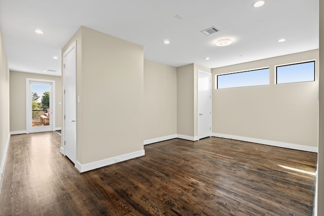 empty room featuring dark hardwood / wood-style floors