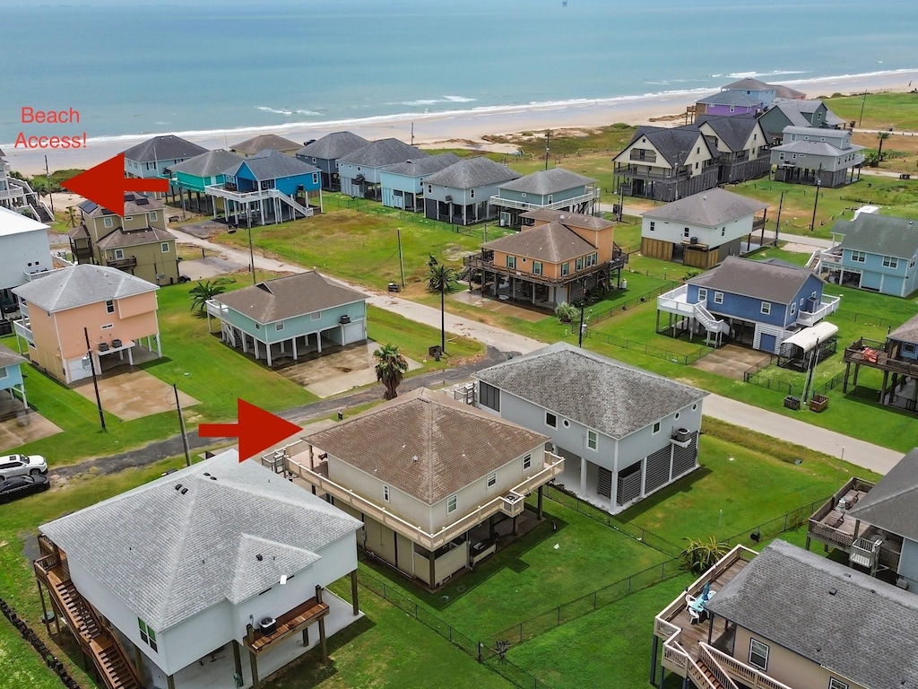 2209 Shrimp, Crystal Beach, TX 77650 - birds eye view of property with a water view and a view of the beach