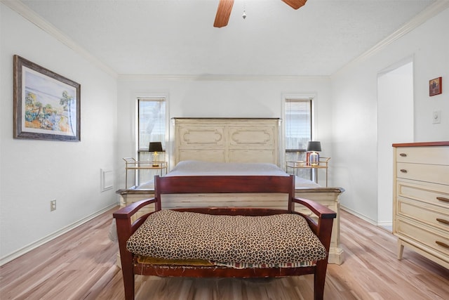 bedroom with multiple windows, ornamental molding, and light wood-type flooring