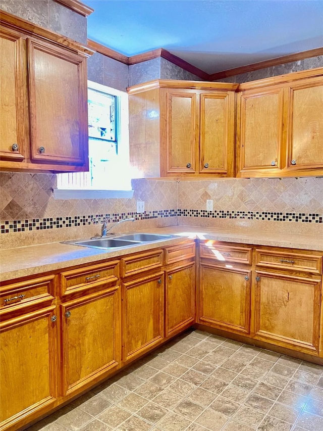 kitchen featuring sink and decorative backsplash