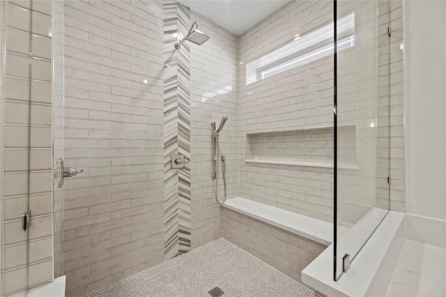 bathroom featuring walk in shower