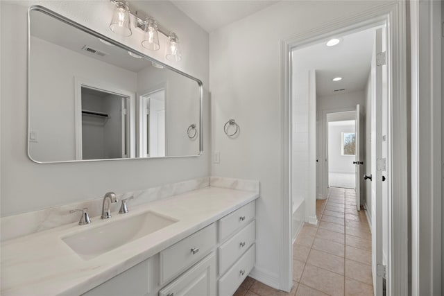 bathroom with vanity and tile patterned flooring