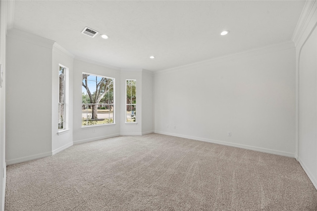 carpeted empty room with ornamental molding