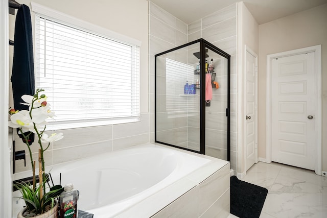 bathroom featuring plus walk in shower