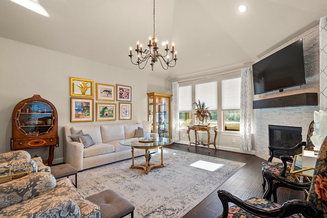 12169 Creekside Villas Ct, Conroe, TX 77304 - living area featuring a chandelier, a fireplace, hardwood / wood-style flooring, lofted ceiling, and recessed lighting