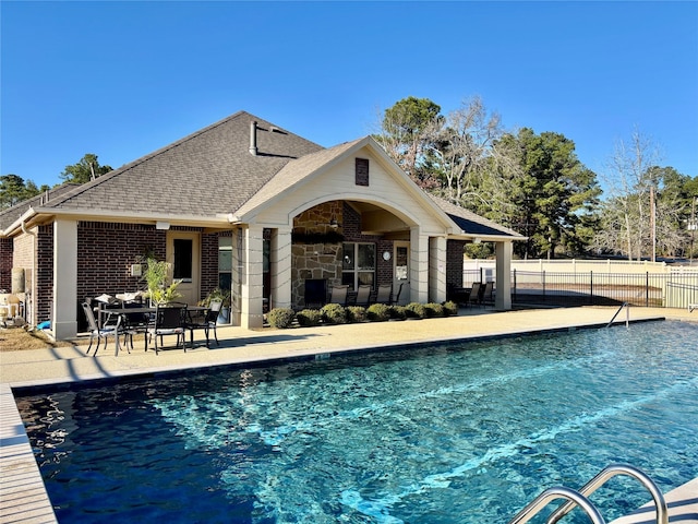 12169 Creekside Villas Ct, Conroe, TX 77304 - community pool featuring a patio area
