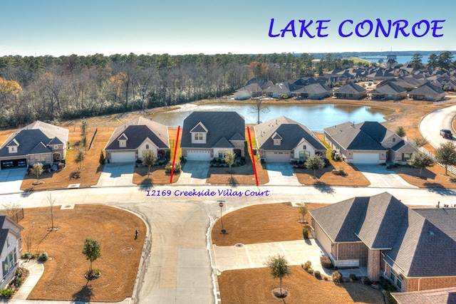 12169 Creekside Villas Ct, Conroe, TX 77304 - aerial perspective of suburban area featuring property boundaries highlighted