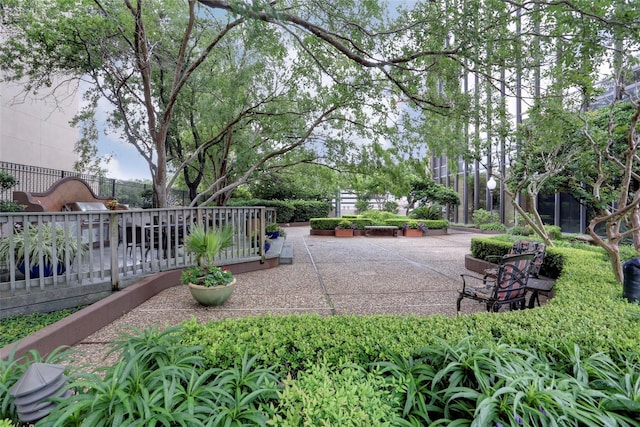 surrounding community featuring a patio area