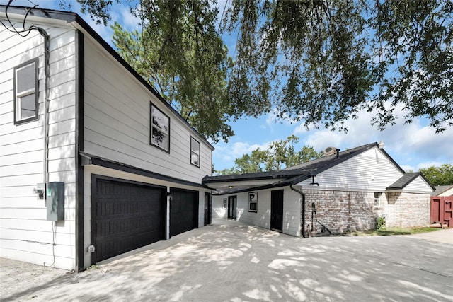 view of home's exterior featuring a garage