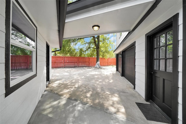 view of patio with a garage