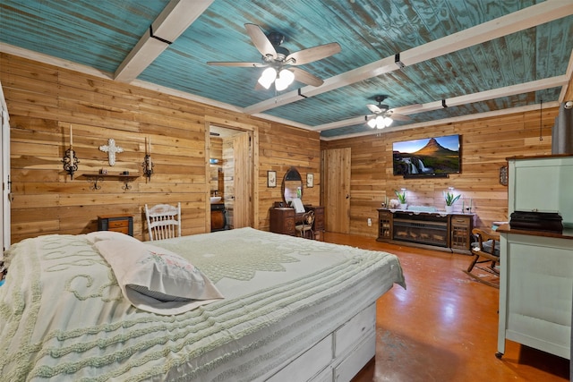 bedroom with ceiling fan, wooden ceiling, wooden walls, finished concrete flooring, and beamed ceiling