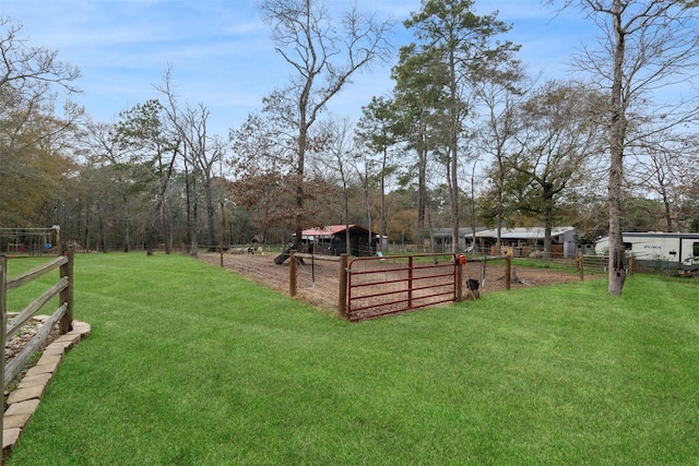 view of yard featuring fence