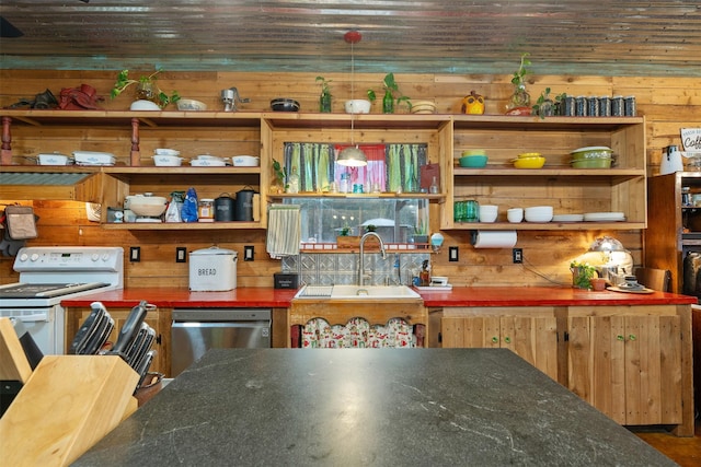 kitchen with wooden walls, stainless steel dishwasher, white stove, open shelves, and a sink