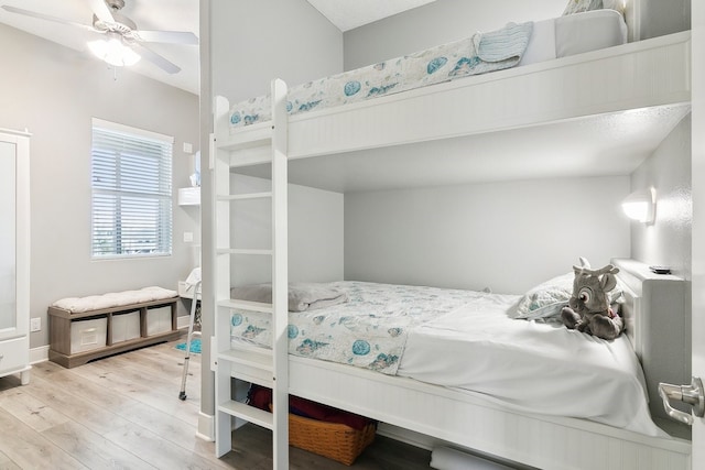 bedroom with ceiling fan and light wood-type flooring