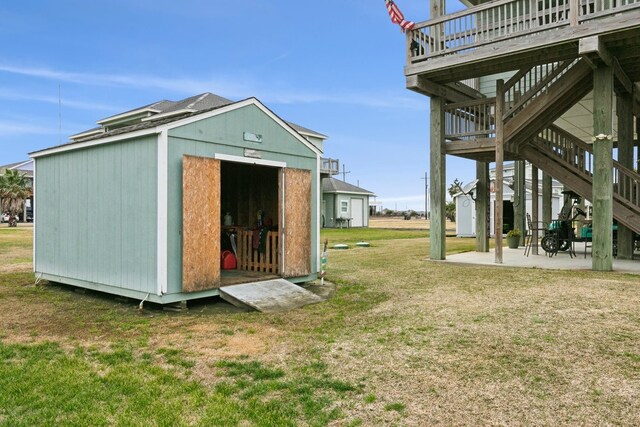 view of outdoor structure with a lawn