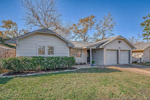 ranch-style house with a garage and a front lawn