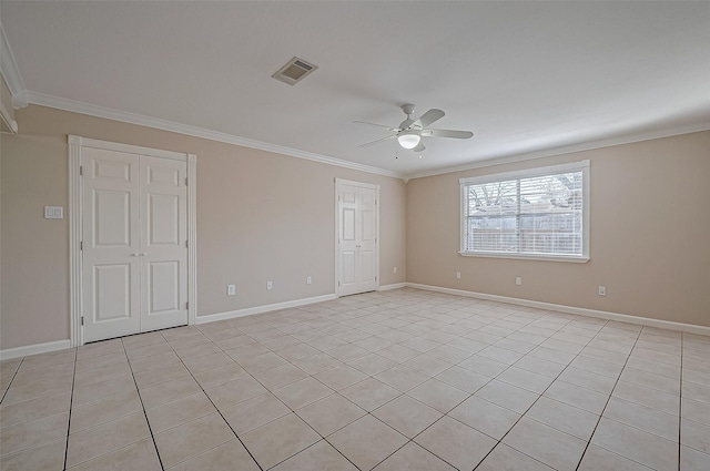 empty room with crown molding and ceiling fan