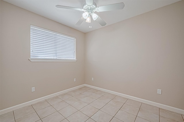 spare room featuring ceiling fan