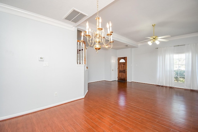 spare room featuring crown molding, ceiling fan with notable chandelier, and dark wood-type flooring