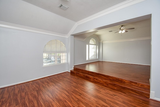 interior space with vaulted ceiling, wood-type flooring, ceiling fan, and ornamental molding