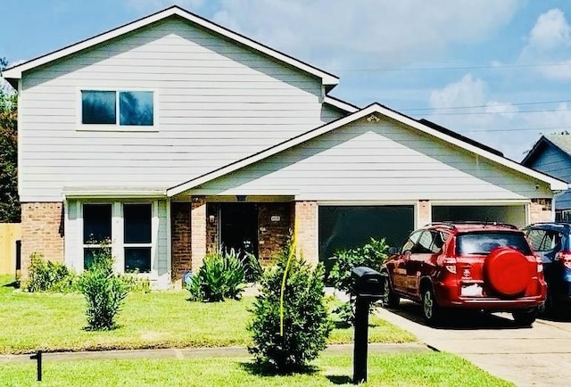 view of front facade featuring a garage and a front lawn