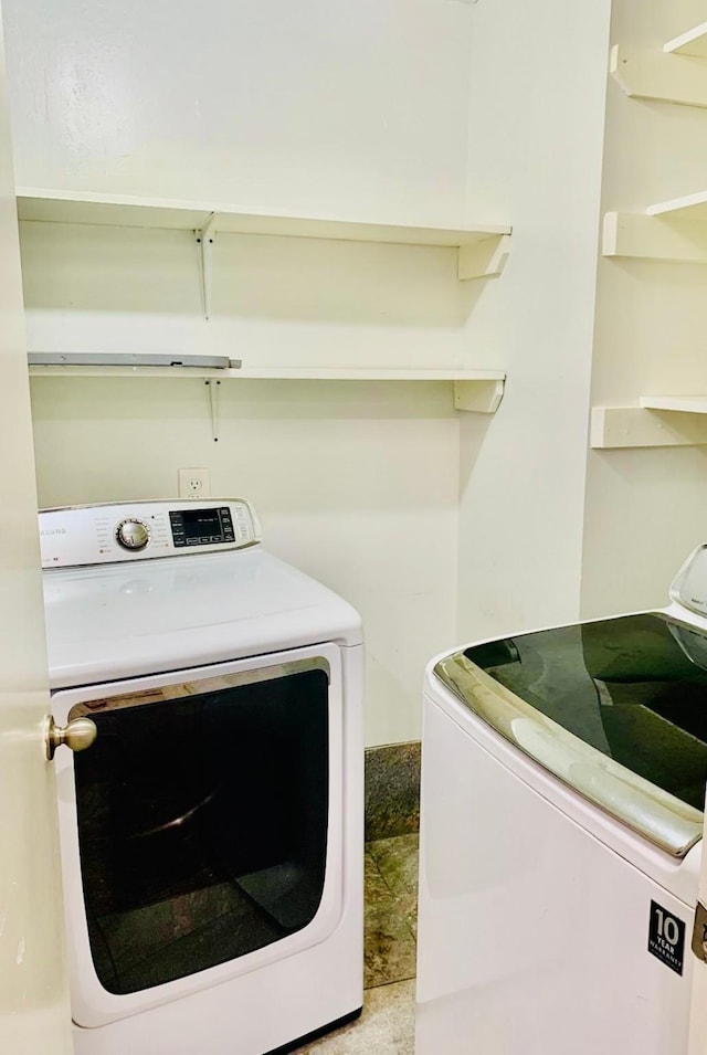 laundry area featuring washing machine and dryer