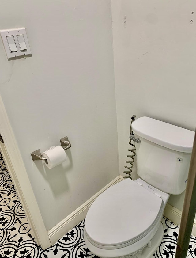 bathroom featuring toilet