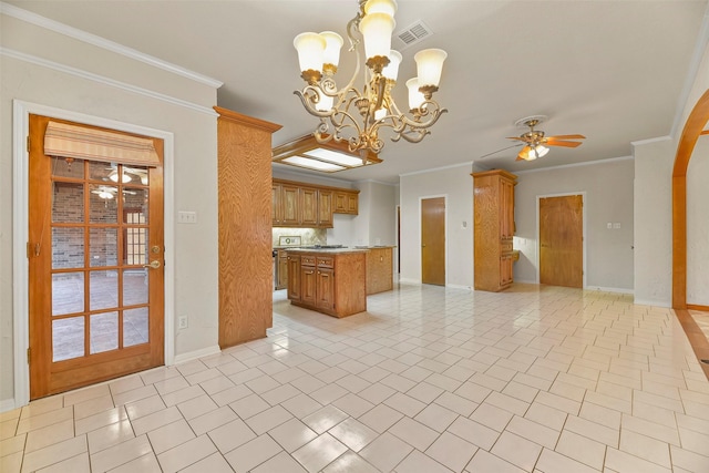 kitchen featuring crown molding, decorative light fixtures, ceiling fan with notable chandelier, and light tile patterned floors