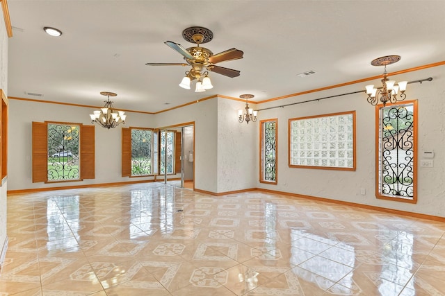 spare room featuring crown molding and ceiling fan with notable chandelier