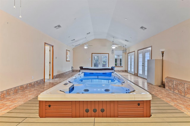 view of pool featuring an indoor hot tub and french doors