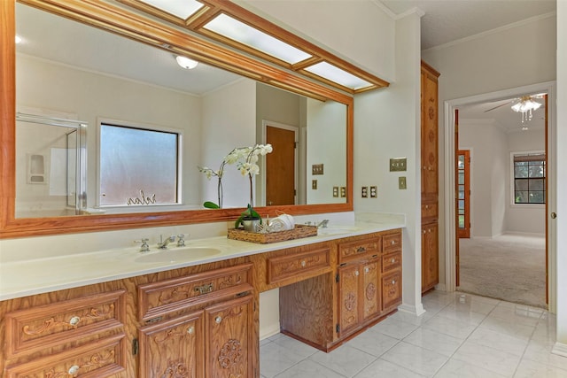 bathroom with vanity and crown molding