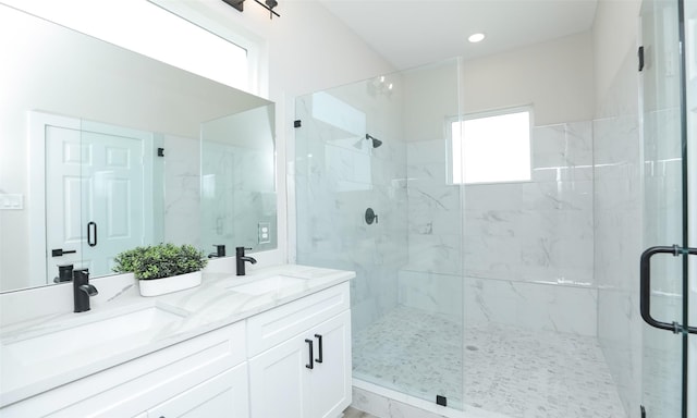 bathroom featuring vanity and walk in shower