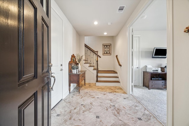 view of carpeted entryway