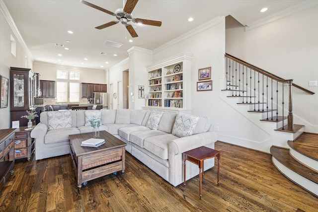 living room featuring dark wood-type flooring, ceiling fan, and crown molding