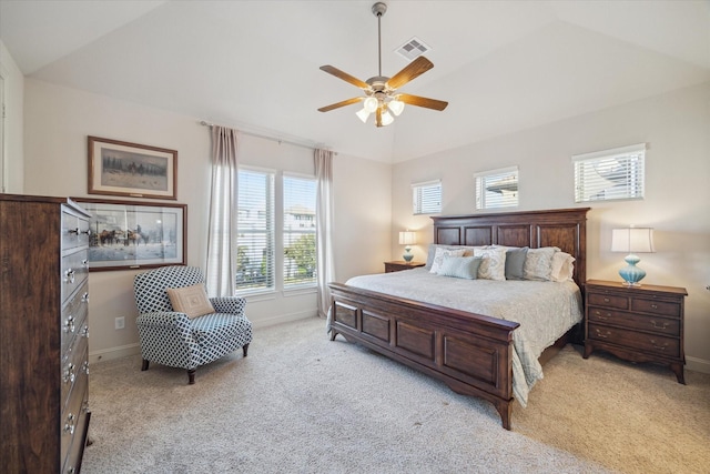 carpeted bedroom featuring ceiling fan and lofted ceiling