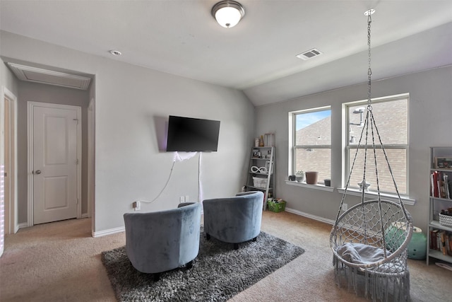 living room with lofted ceiling and carpet