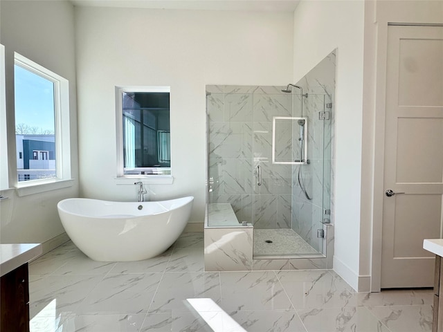 bathroom with vanity and plus walk in shower