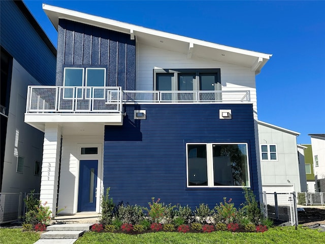 contemporary home featuring a balcony