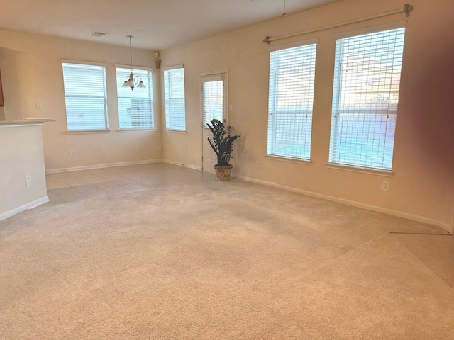 view of carpeted spare room