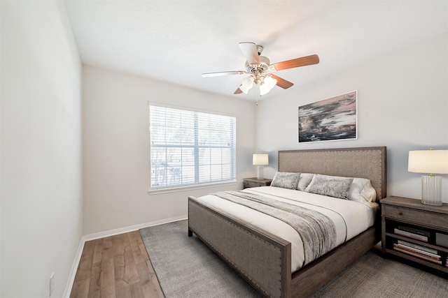 bedroom featuring ceiling fan and hardwood / wood-style floors