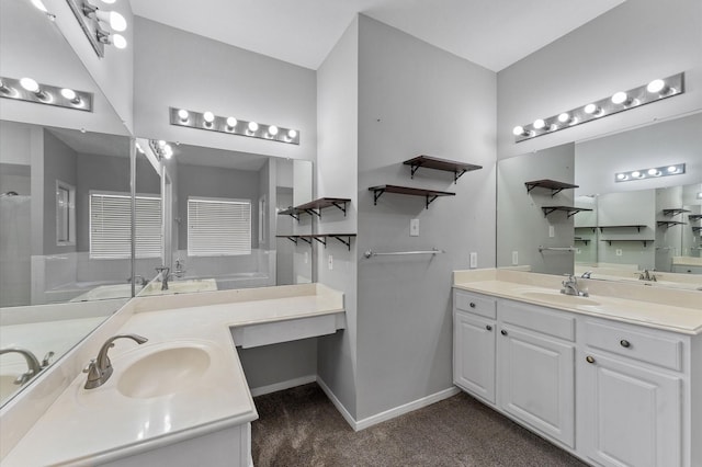 bathroom with vanity and walk in shower